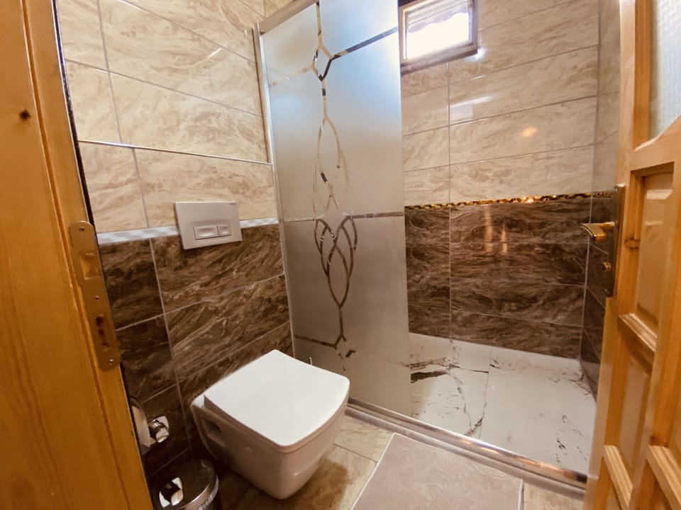 Family Duplex | Bathroom | Combined shower/tub, rainfall showerhead, hair dryer, bathrobes
