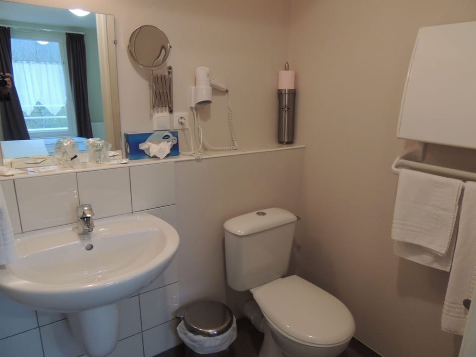 Shower, eco-friendly toiletries, hair dryer, towels