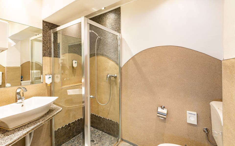 Basic Double Room | Bathroom | Shower, free toiletries, hair dryer, towels