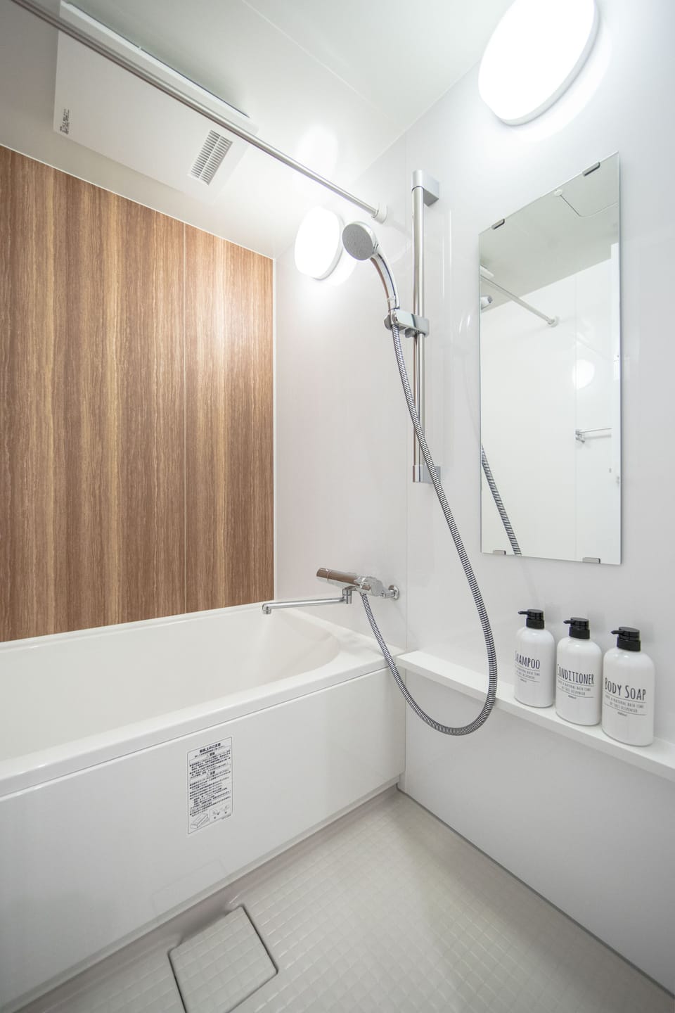Separate tub and shower, free toiletries, hair dryer, slippers