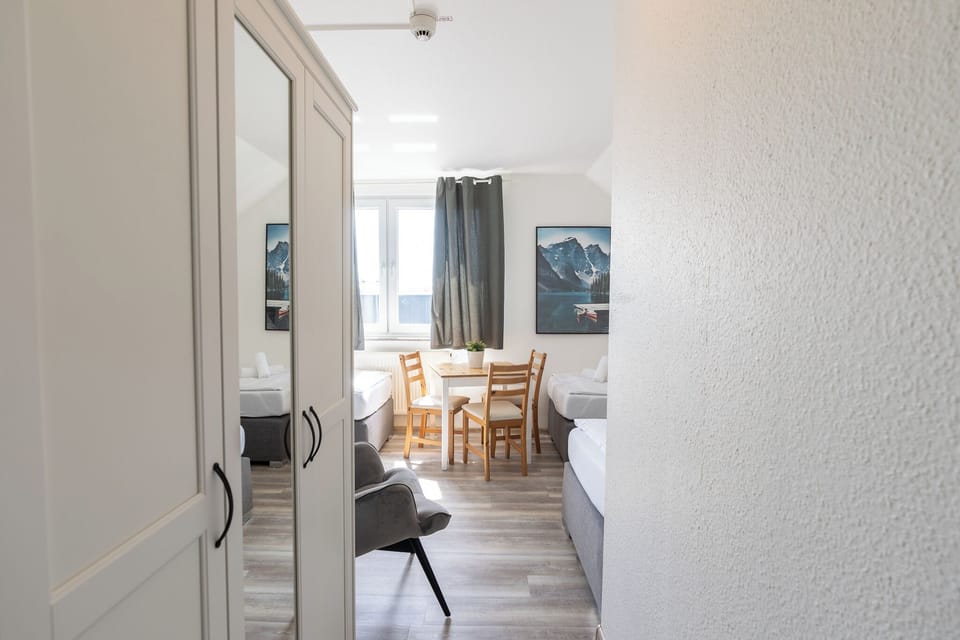 Family Room, Multiple Beds | Desk, laptop workspace, WiFi (free), bed sheets