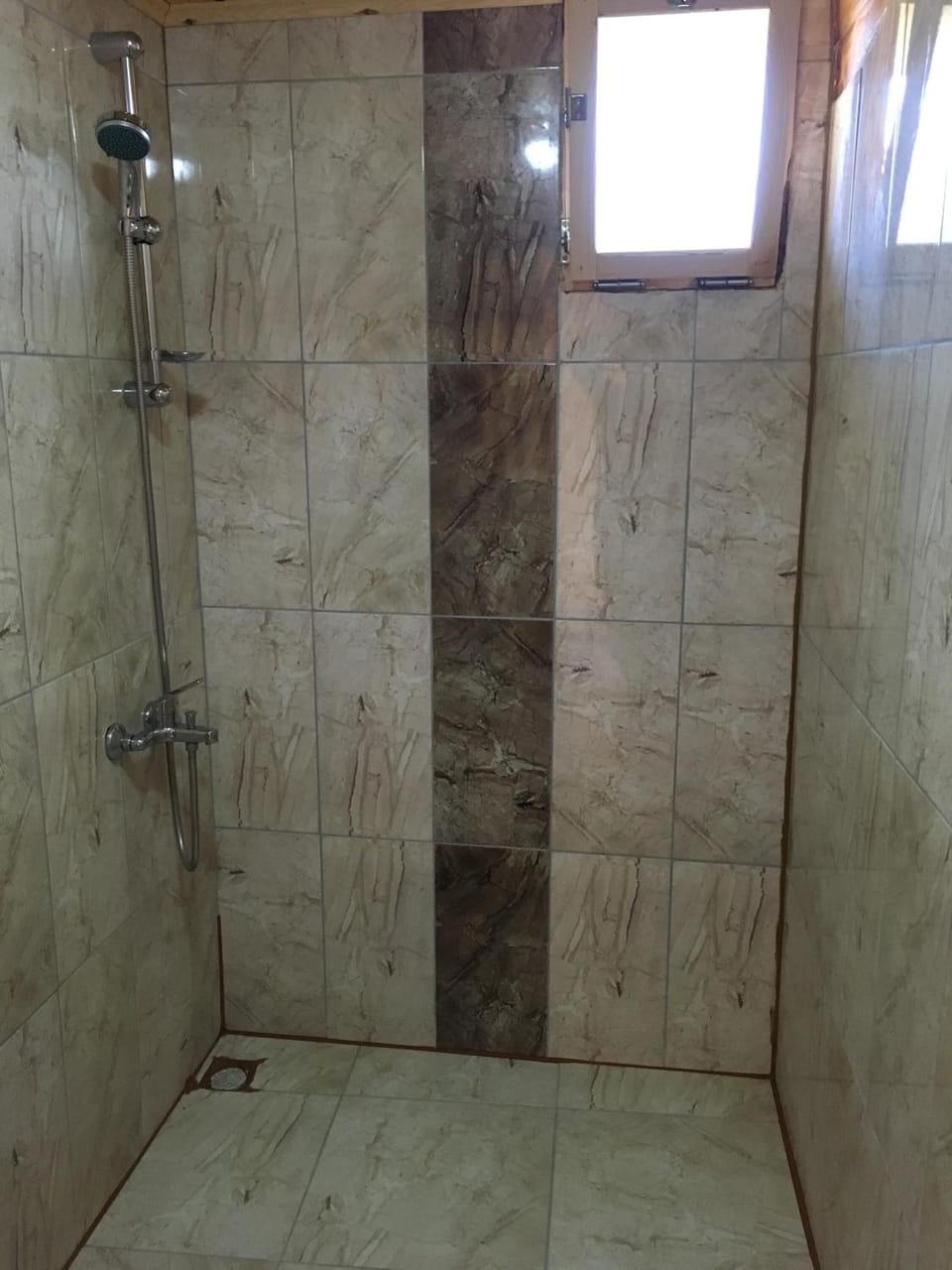 Shower, free toiletries, hair dryer, slippers
