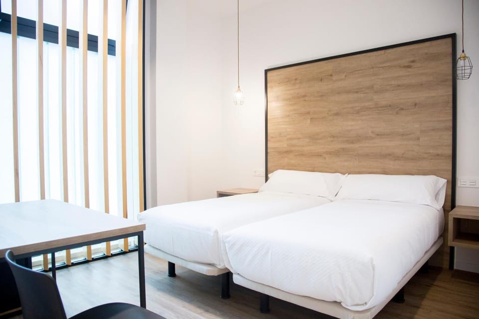 Desk, free WiFi, bed sheets