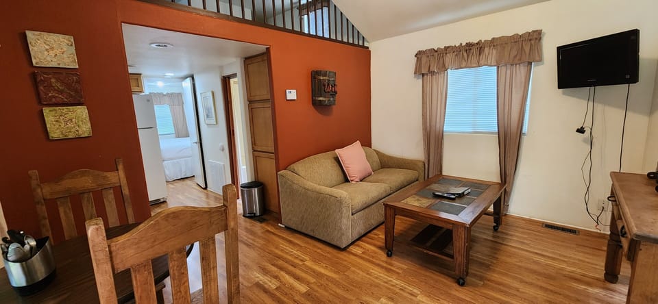 Fig Cabin, 1 Bedroom | Living area | Flat-screen TV