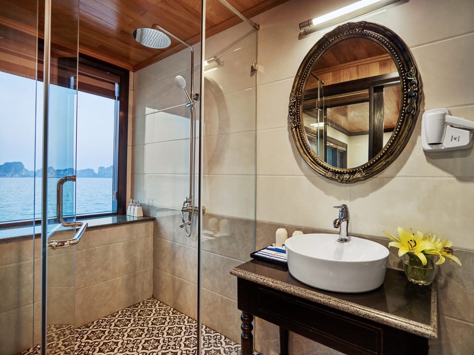 Shower, free toiletries, hair dryer, slippers