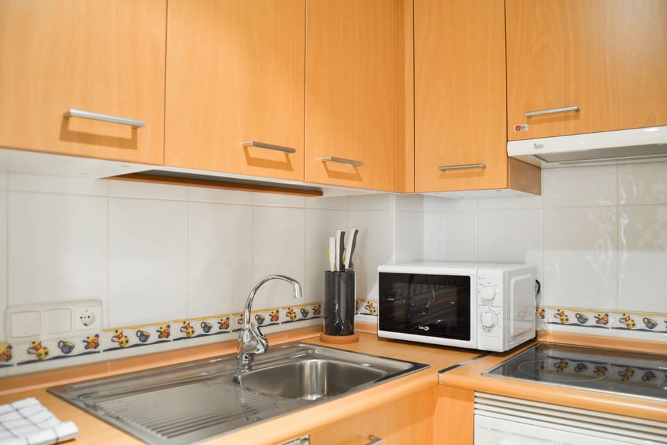 Apartment, 1 Bedroom, Balcony | Private kitchen | Full-size fridge, microwave, coffee/tea maker, electric kettle