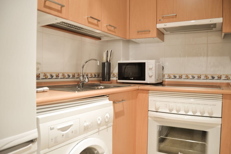 Apartment, 1 Bedroom, Balcony | Private kitchen | Full-size fridge, microwave, coffee/tea maker, electric kettle