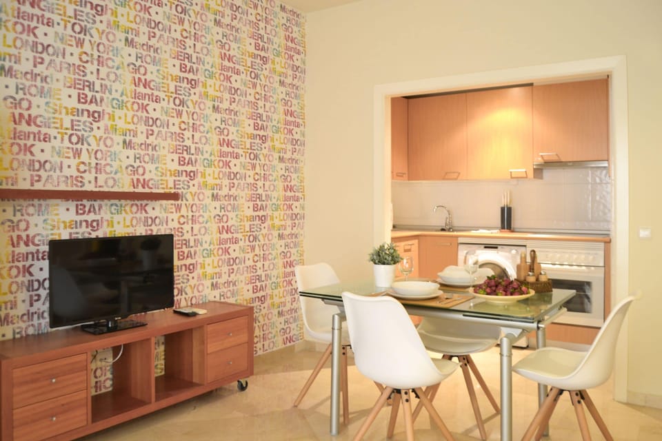Apartment, 1 Bedroom, Balcony | Living room | Flat-screen TV