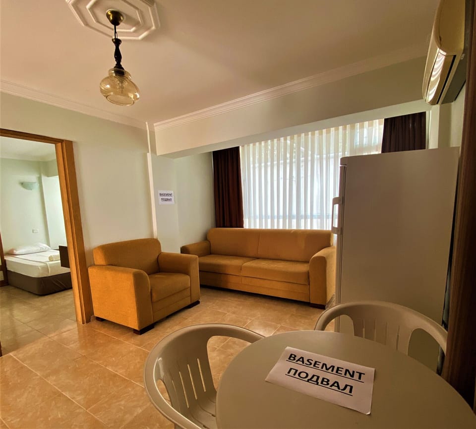 Economy Apartment | Living area | TV