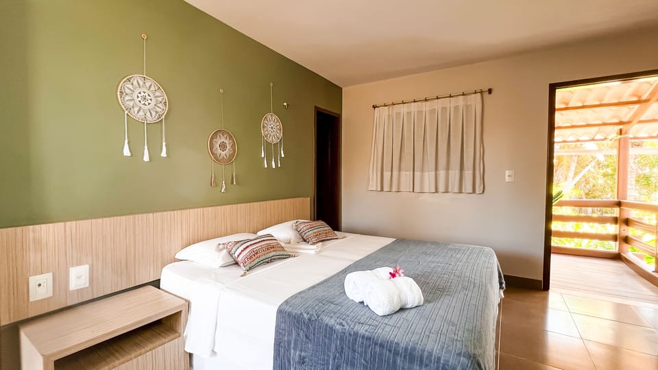 Double Room (Pitaguari) | Minibar, iron/ironing board, free wired internet, bed sheets