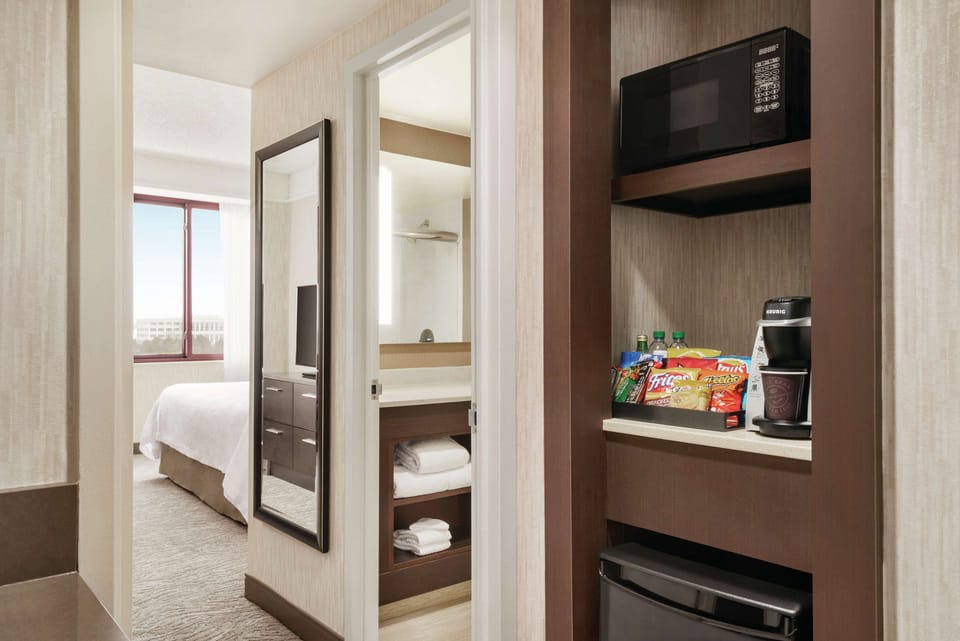 In-room safe, desk, laptop workspace, iron/ironing board