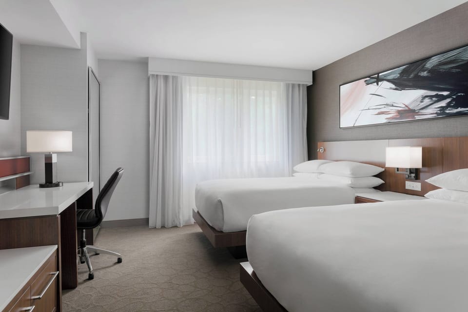 Premium bedding, desk, blackout drapes, iron/ironing board