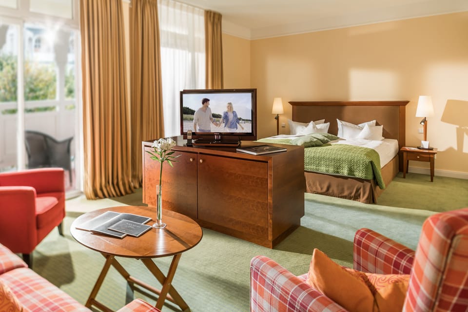 Deluxe-Doppelzimmer mit Balkon | Hypo-allergenic bedding, minibar, in-room safe, individually decorated