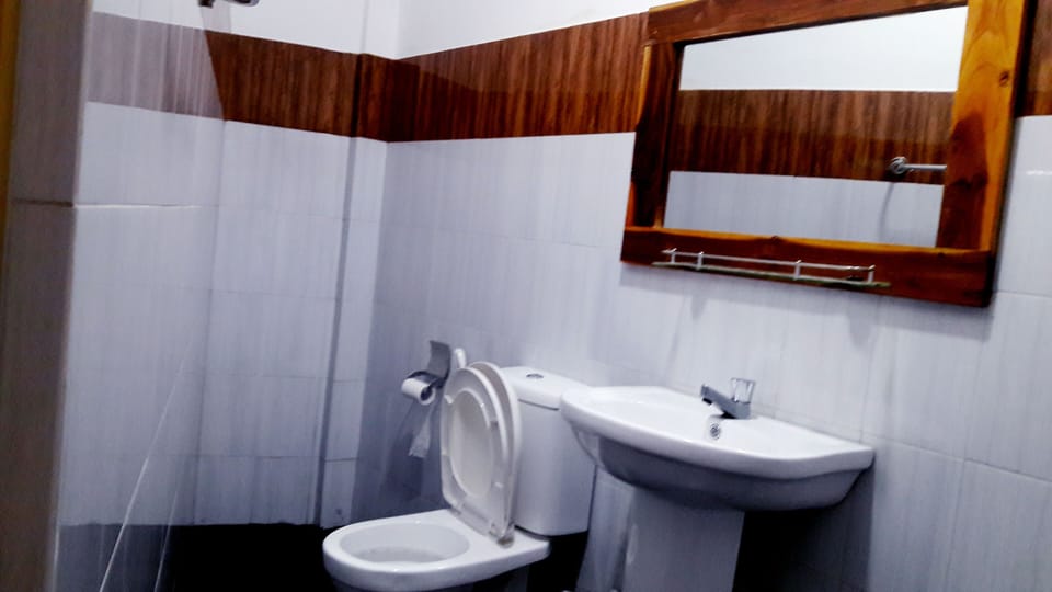 Family Suite, 1 Bedroom, Garden View, Ground Floor | Bathroom | Shower, rainfall showerhead, free toiletries, hair dryer