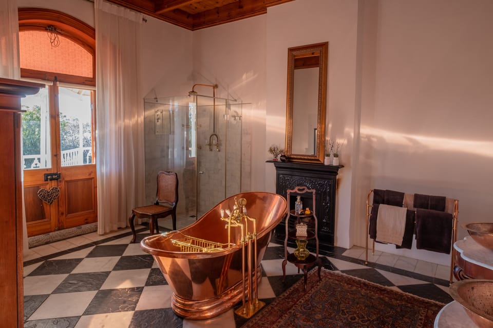 The Savannah Room | Bathroom | Shower, hair dryer, towels