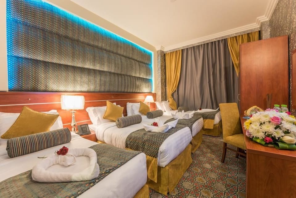 Standard Quadruple Room | Minibar, in-room safe, soundproofing, iron/ironing board (on request)