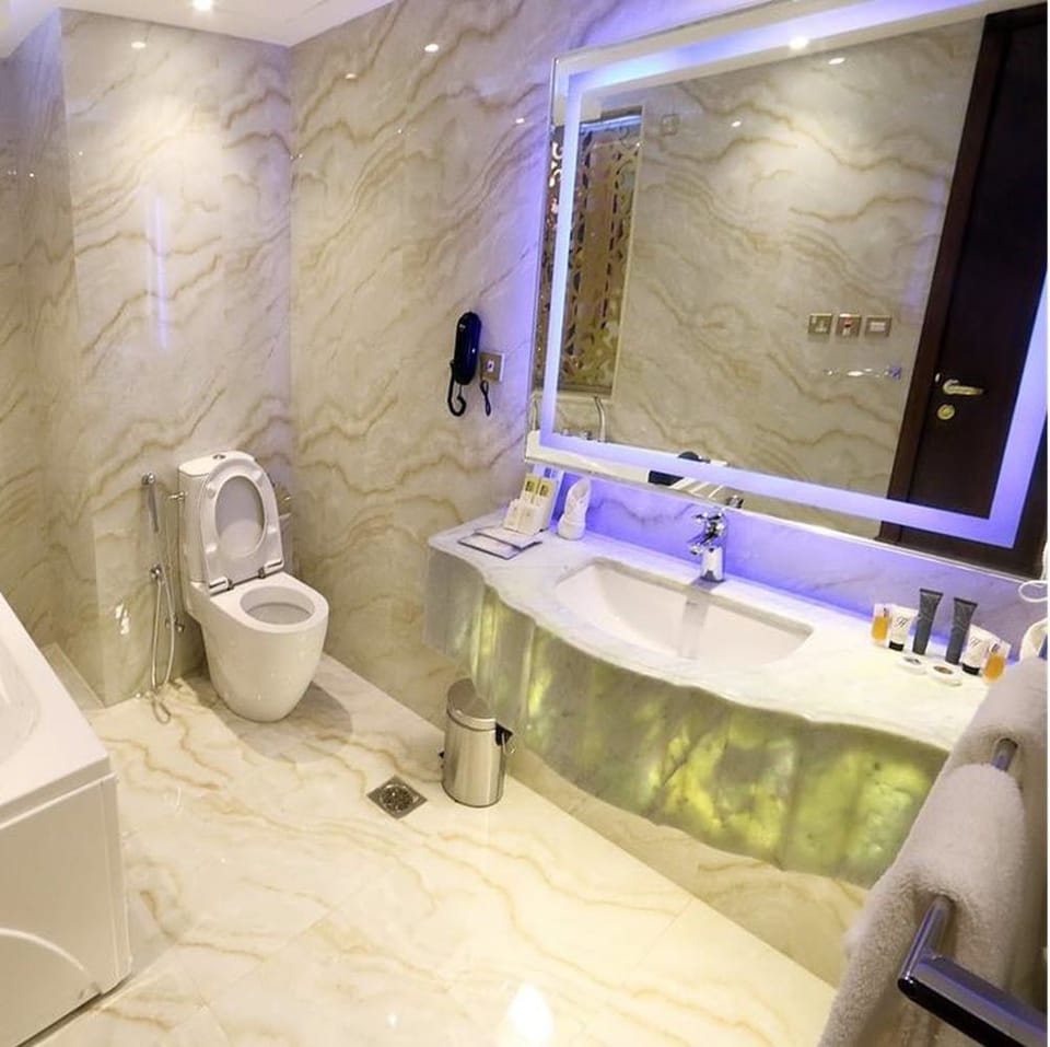 Shower, free toiletries, hair dryer, bidet