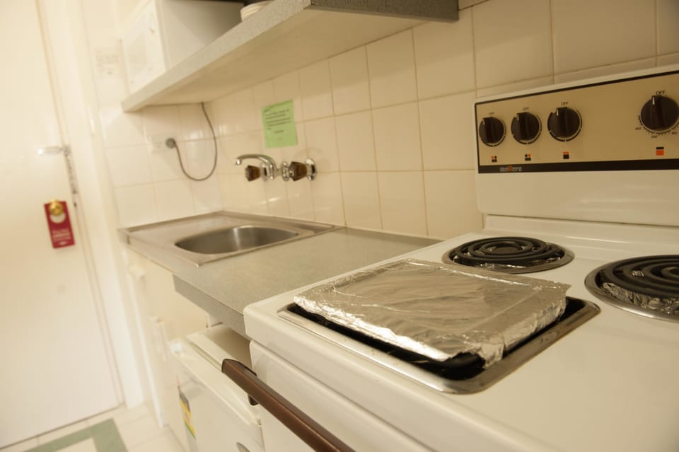 Studio Self-Contained | Private kitchen | Fridge, microwave, electric kettle, toaster