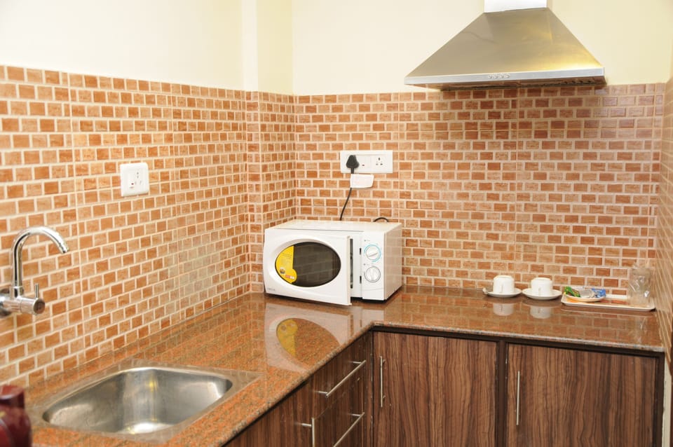 Fridge, microwave, coffee/tea maker