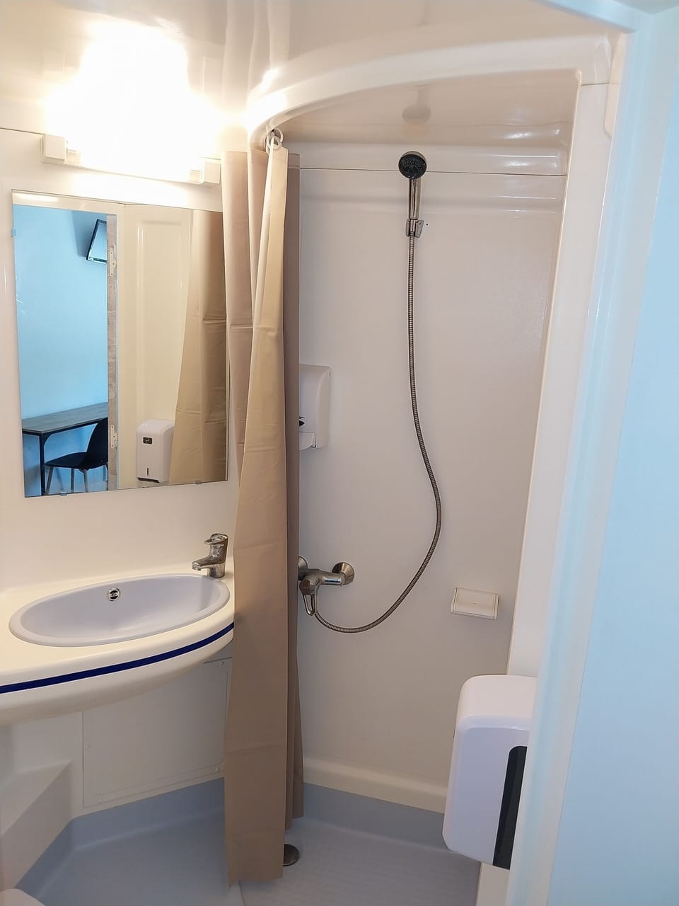 Shower, rainfall showerhead, towels, soap