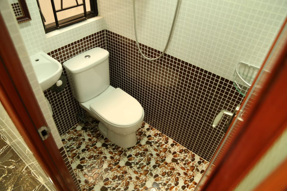 Shower, free toiletries, hair dryer, slippers