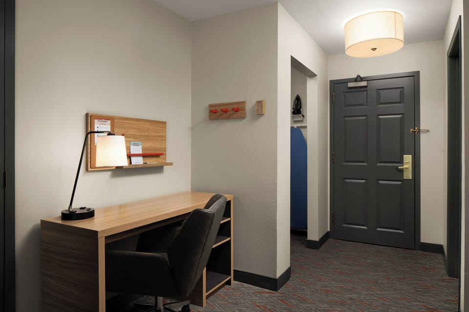 Premium bedding, down comforters, pillowtop beds, in-room safe