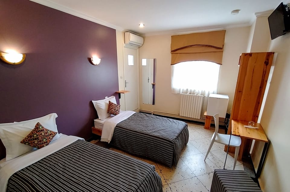 Twin Room | Premium bedding, blackout drapes, iron/ironing board (on request)