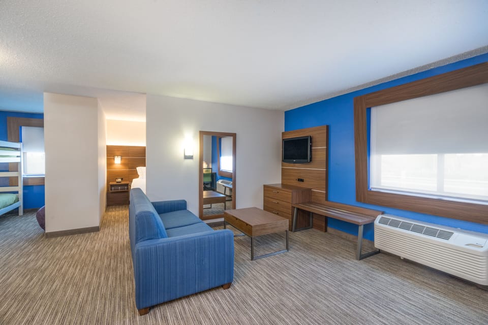 Suite, 1 King Bed with Sofa bed | In-room safe, desk, laptop workspace, blackout drapes