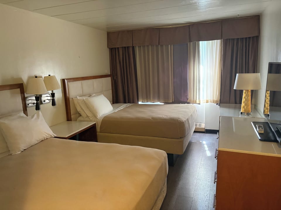 Double Room, 2 Double Beds | In-room safe, desk, laptop workspace, blackout drapes
