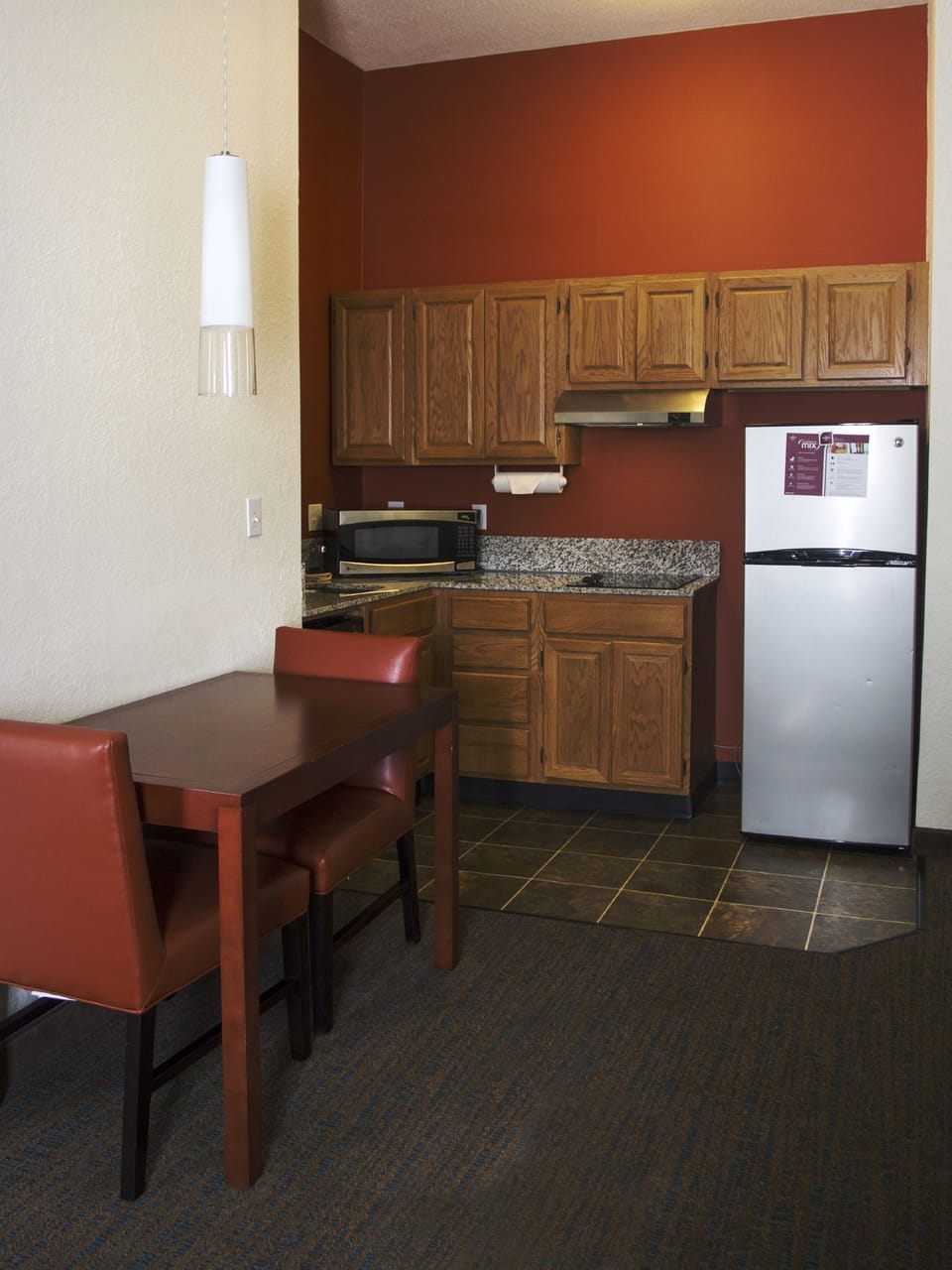Premium bedding, desk, laptop workspace, blackout drapes