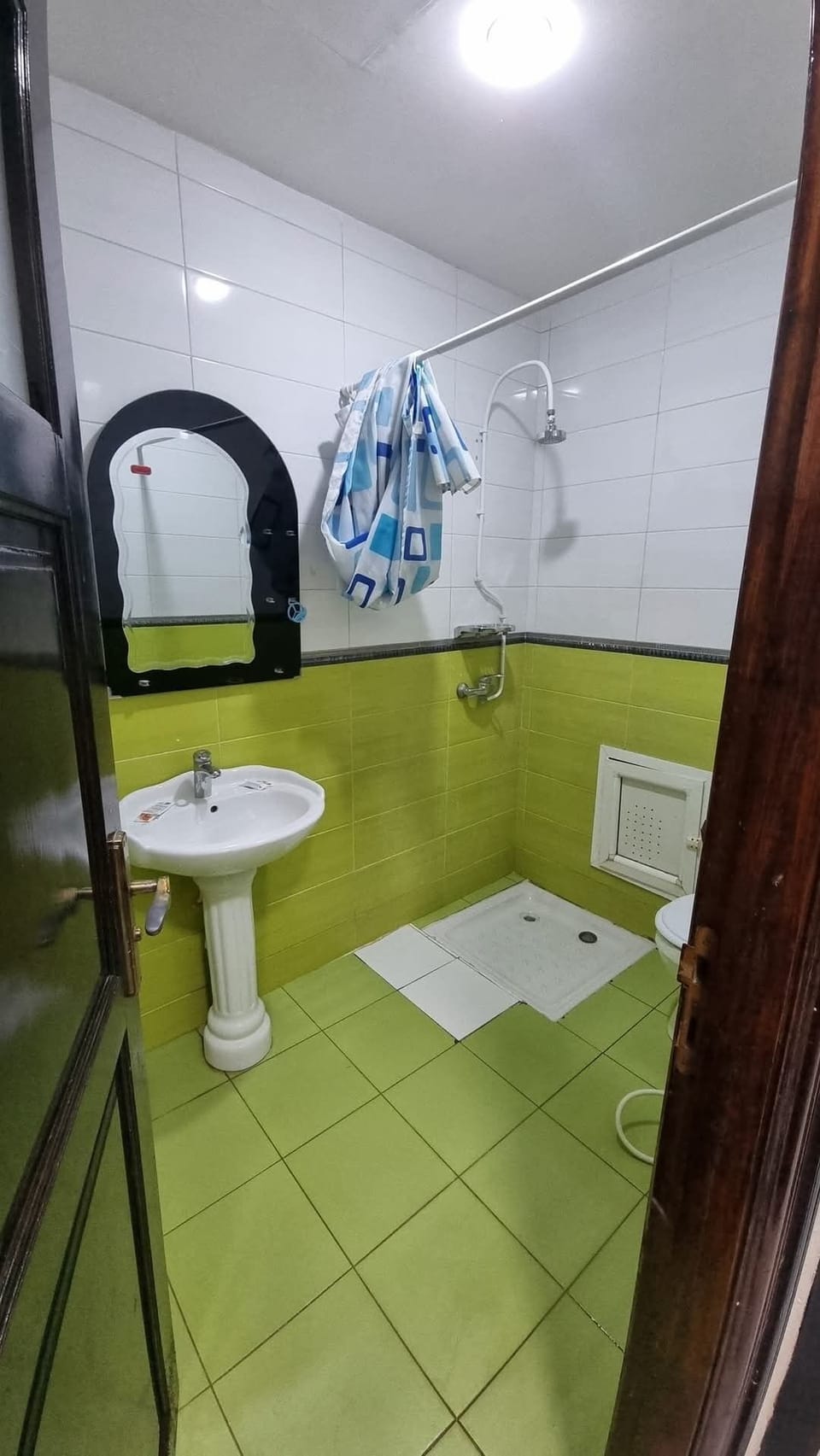 Basic Single Room | Bathroom | Shower, free toiletries, hair dryer, slippers