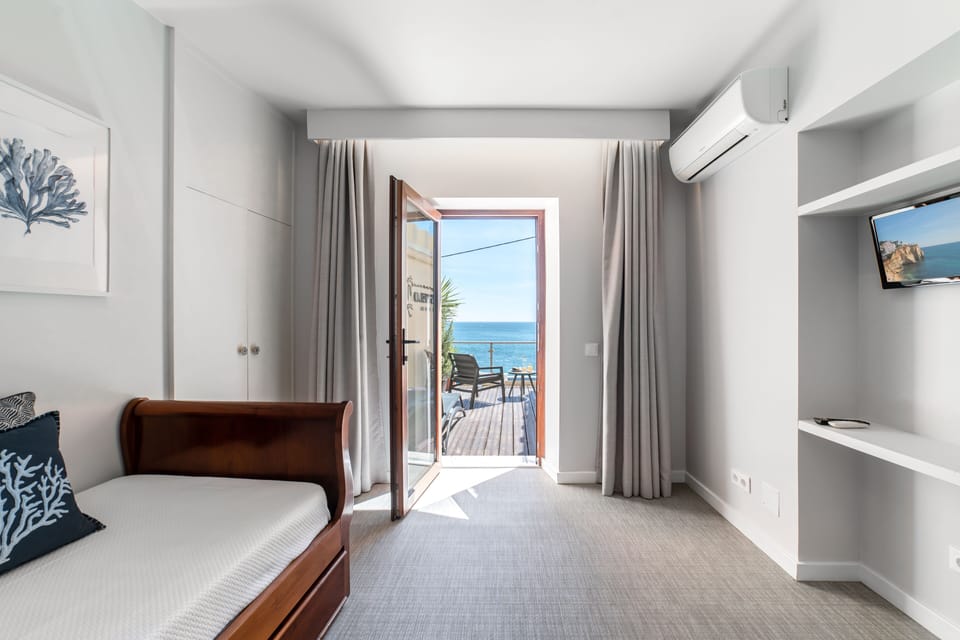 Family Room, Balcony, Sea View | Minibar, individually decorated, individually furnished, free WiFi