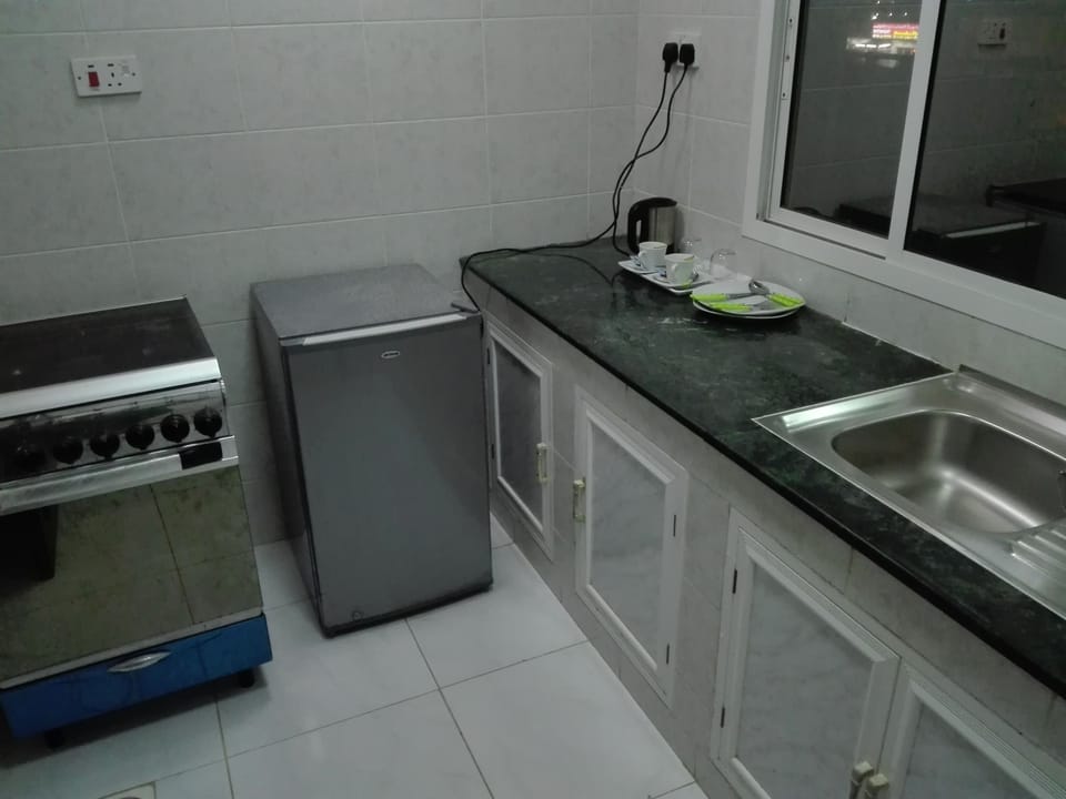 Deluxe Studio, 1 Bedroom, Beach View | Private kitchen | Electric kettle