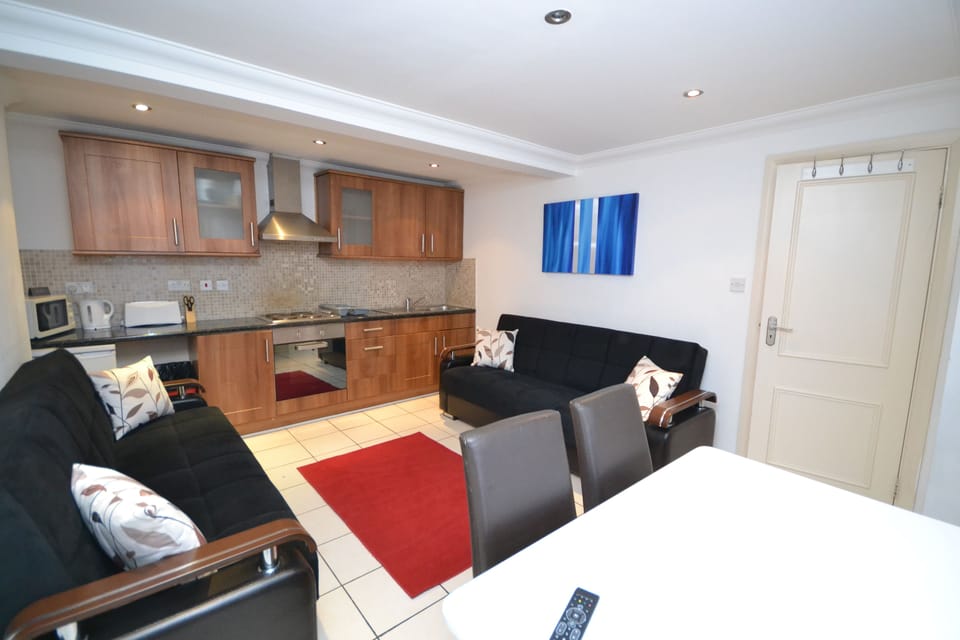 Apartment, 2 Bedrooms | Living area | Flat-screen TV