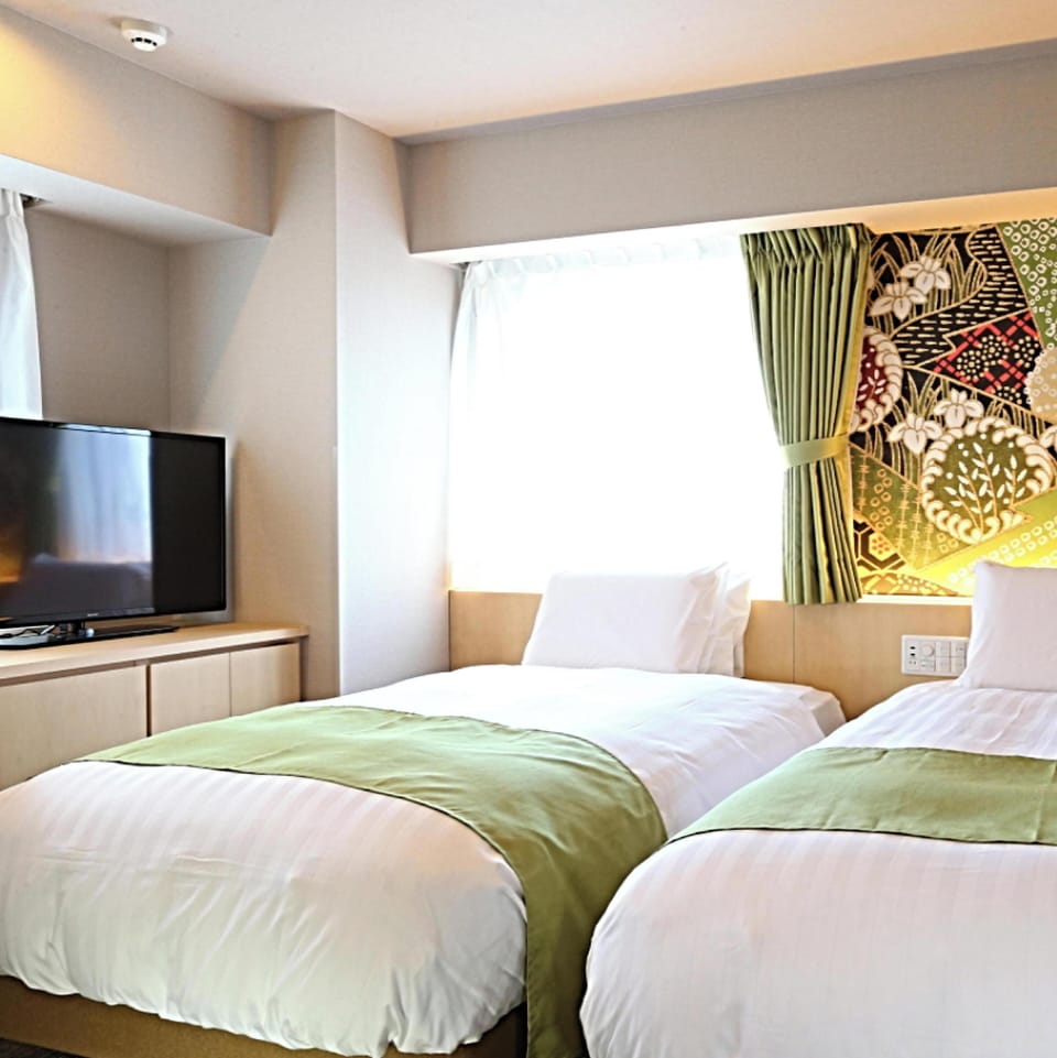 Twin Room, Non Smoking | In-room safe, desk, blackout drapes, iron/ironing board