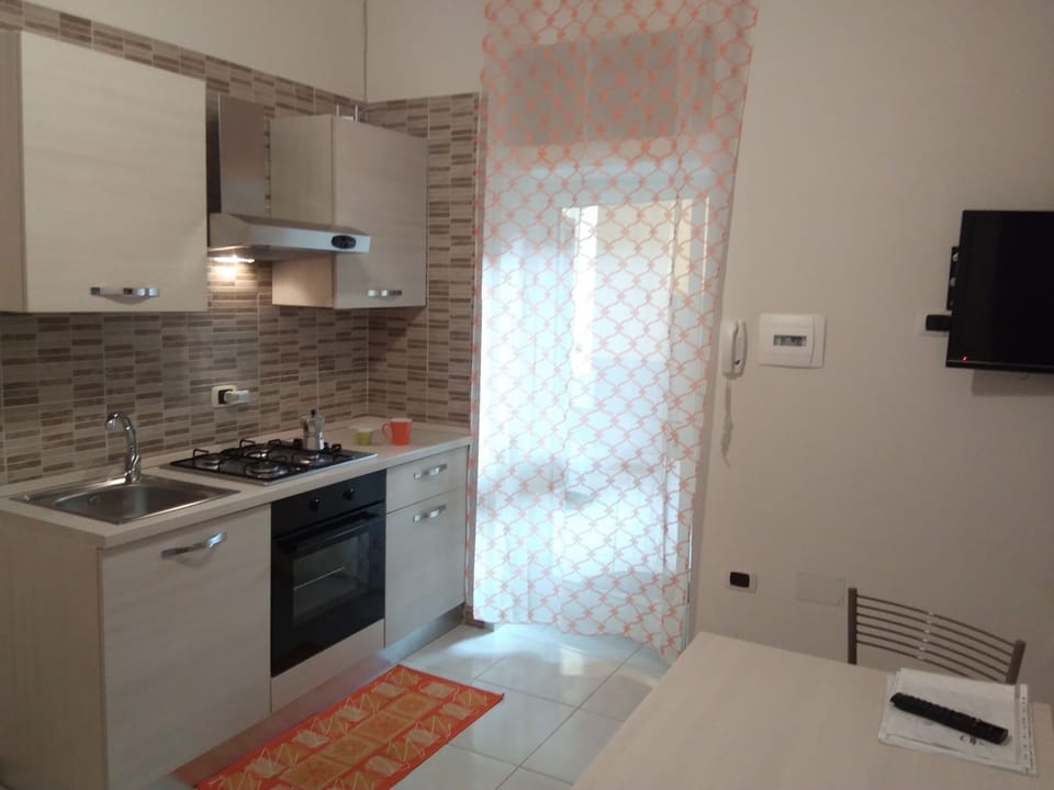 Standard Studio, Courtyard Area | Private kitchenette | Shared fridge, espresso maker, electric kettle, cleaning supplies