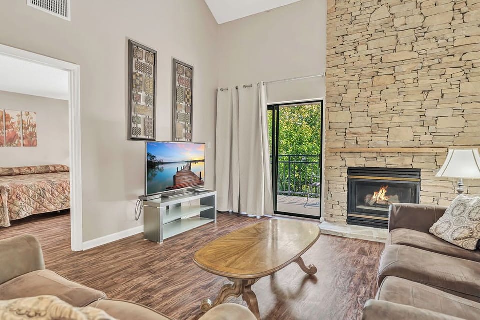 The private balcony is accessed from the living area