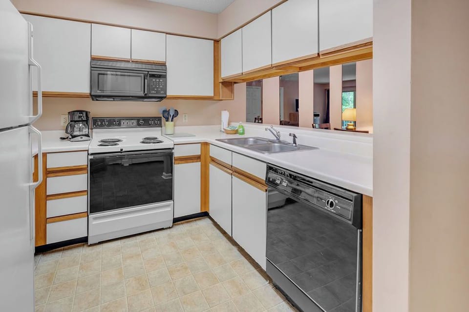 Full size appliances in this fully equipped kitchen