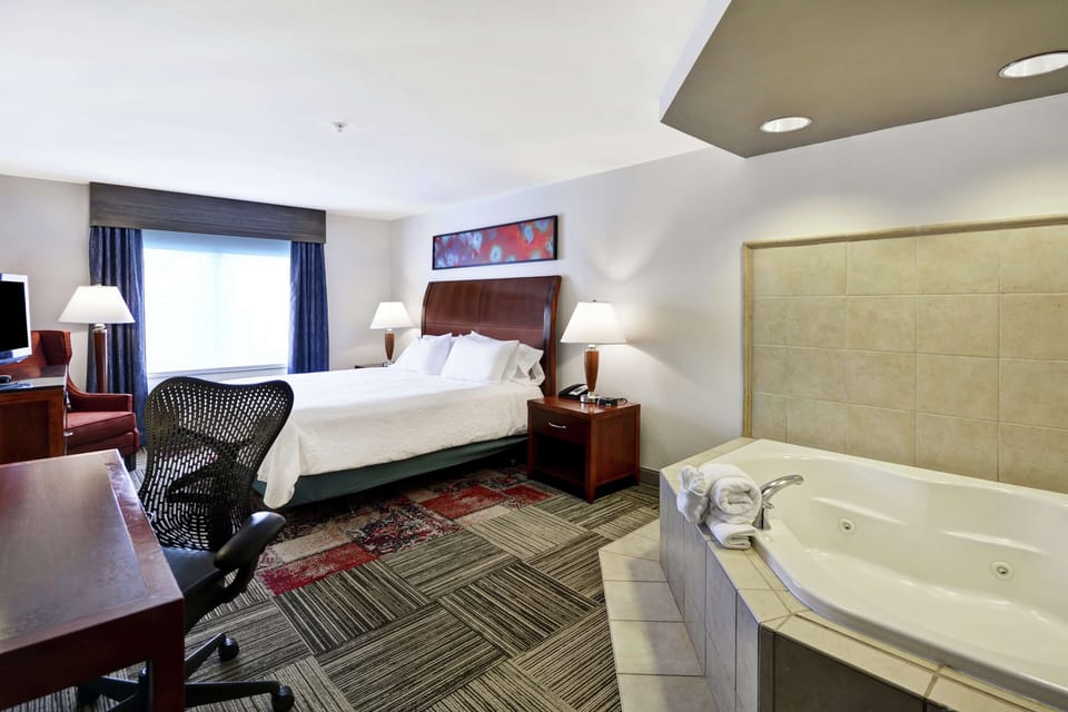 Premium bedding, individually furnished, desk, laptop workspace