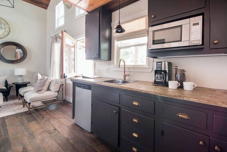 Kitchenette with microwave, mini-fridge, and essentials