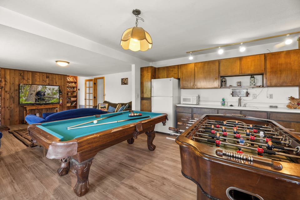 Game Room - Game Room Pool Table and Foosball Table for family bonding located downstairs.