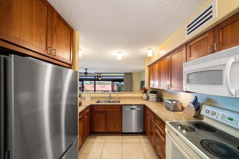 Spacious kitchen with full-size appliances and granite countertops