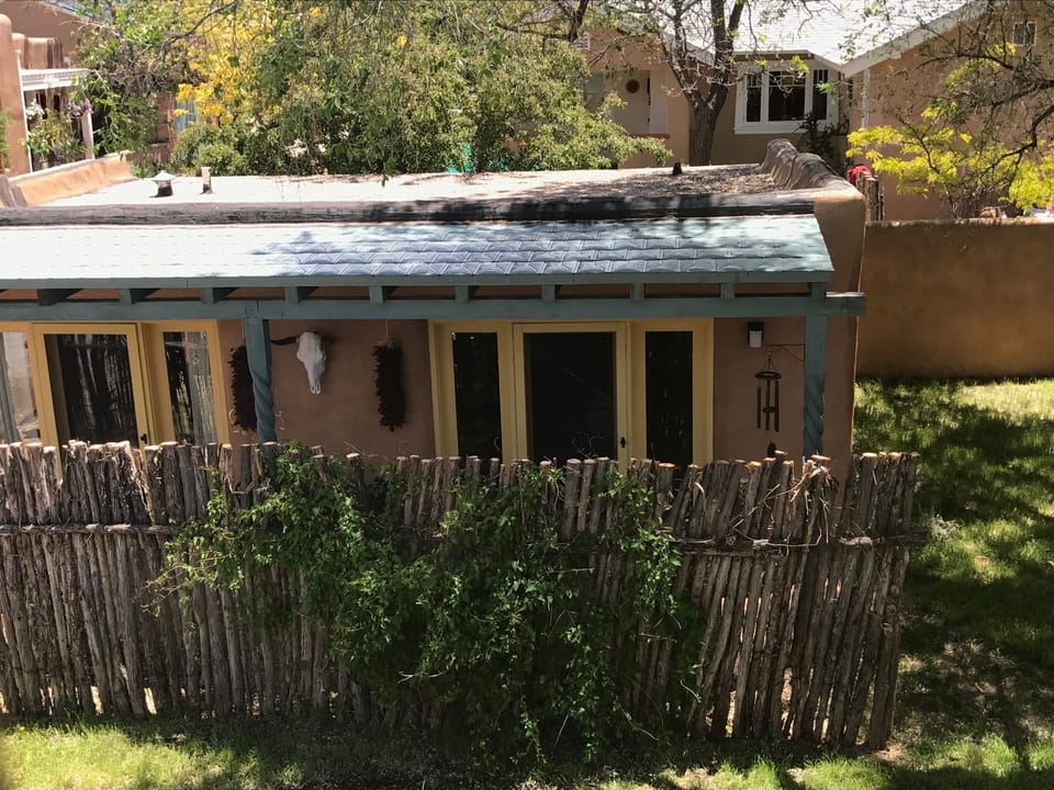 The guest house - located in our backyard. Photo also shows 2 closest neighbors.