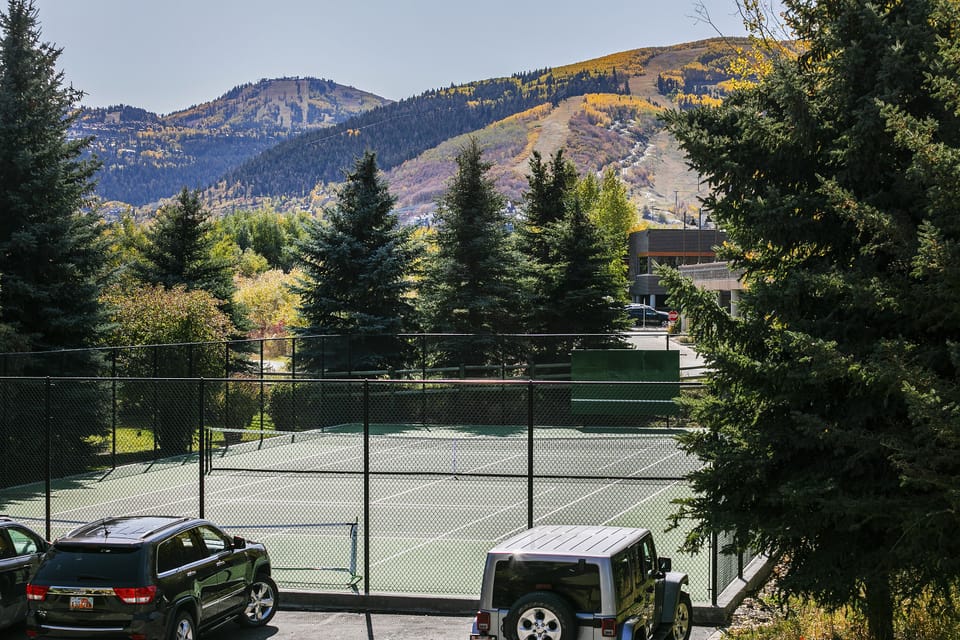 View from your condo deck of the tennis courts and the slopes!
