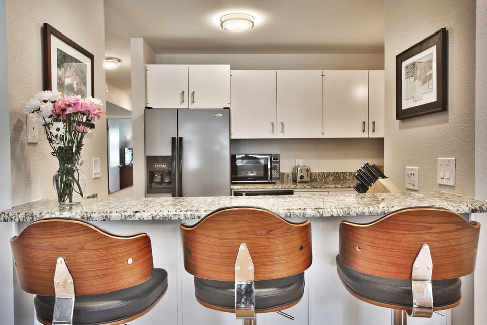 Kitchen with Breakfast Bar seating for 3.  Free High Speed Wifi Internet Access