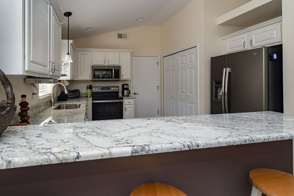 Countertop  with two stools in Kitchen