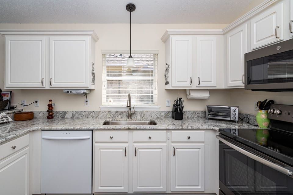 Full kitchen, dishes, pots, pans, utensils, etc.