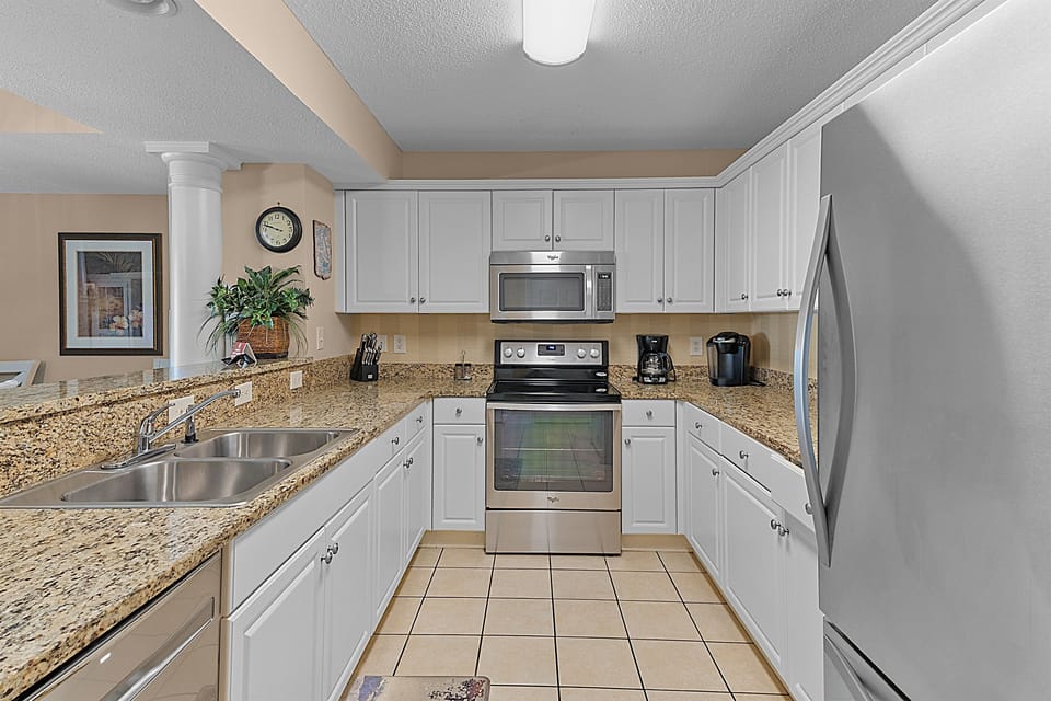 Our fully updated kitchen complete with stainless steel appliances and solid granite counters