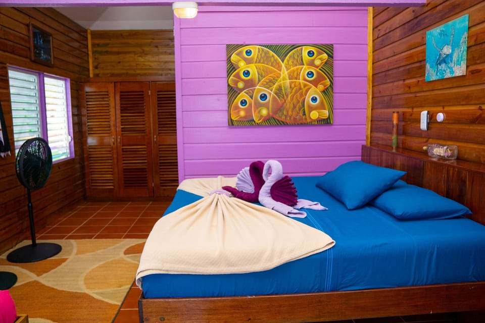 Comfortable Island Accommodations Featuring King Bed, Double Bed and Ocean Breez