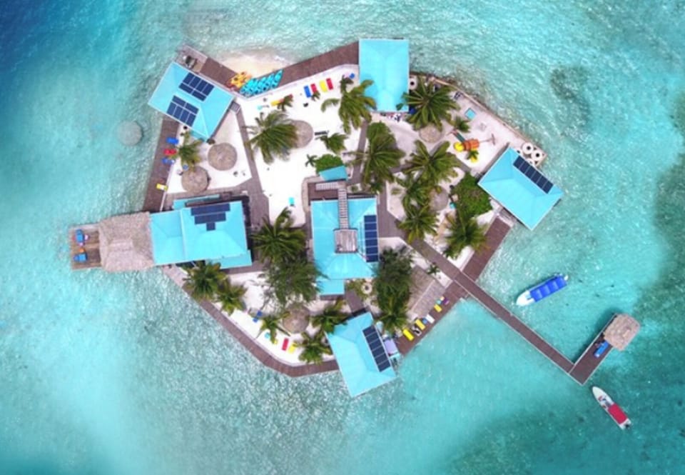 Exclusive Caribbean Island Escape Featuring Overwater Accommodations, Crystal-Cl